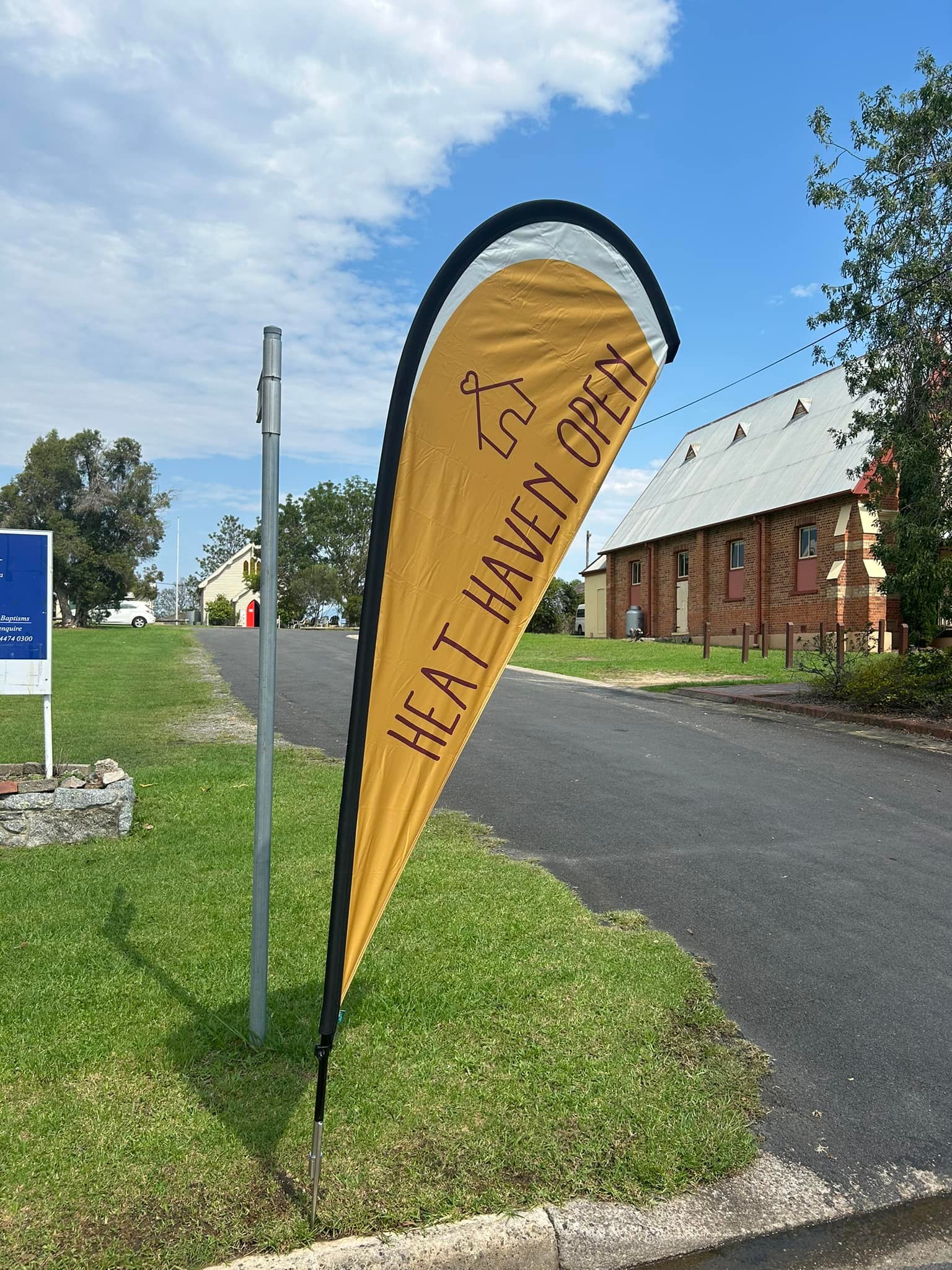 Banner displayed at the front of Red Door Hall, Moruya